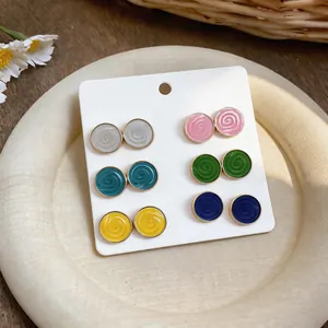 Set of 6 pairs colorful round enamel stud earrings with spiral design on display card