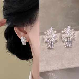 Elegant flower basket earrings with pearls and zircons, 18k gold plated silver needle