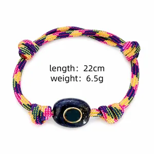 Close-up view of bohemian braided bracelet with lucky eye stone, 22cm length, 6.5g weight