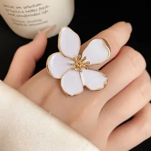 Vintage oversized white flower ring with gold metallic trim for women