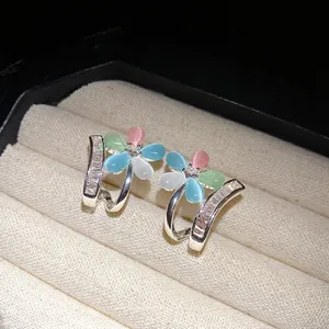 Eleganti orecchini a fiore a doppio strato in argento con zirconi e pietre occhio di gatto