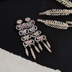 Luxury gold-tone chandelier earrings with iridescent AB rhinestones and hollow heart design