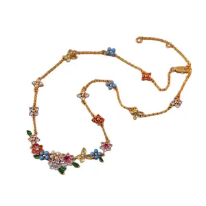 Elegant 18k gold plated bracelet featuring colorful zircon flowers and dainty pearls