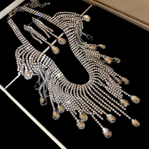 Stunning close-up view of silver rhinestone tassel necklace featuring teardrop crystal pendants