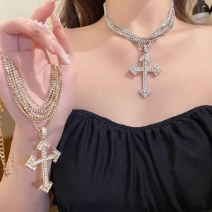Elegant iced-out multi-layered cross pendant necklace with sparkling rhinestones