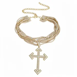 Exquisite multi-layered gold choker with a large rhinestone-encrusted cross pendant