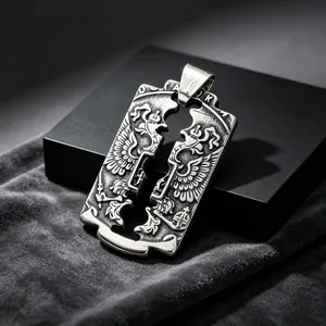 Detail view of retro stainless steel military pendant with double-headed eagle engraving