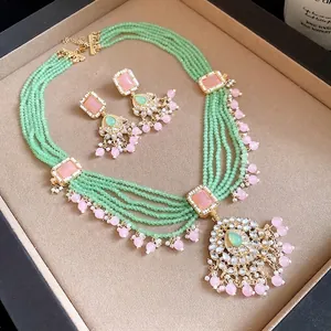 Vintage mint green bead and pink resin stone jewelry set with matching earrings