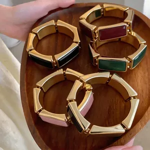 Vintage dikke rechthoekige schakelarmbanden met kleurrijk email in goudkleurige zetting