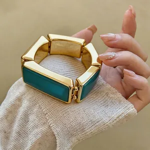 Retro grove rechthoekige gesegmenteerde armband in goud en teal emaille