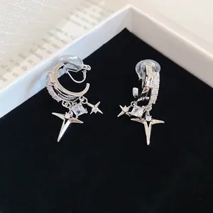 Detail of double-layer zircon star ear clips with 18k white gold plating finish
