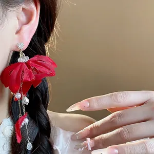 Elegant red fabric flower earrings with pearl tassels and crystal drops for women.