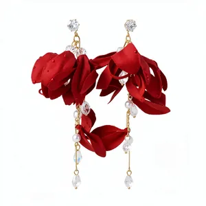 Elegant red fabric flower drop earrings featuring pearls and sparkling crystal tassels
