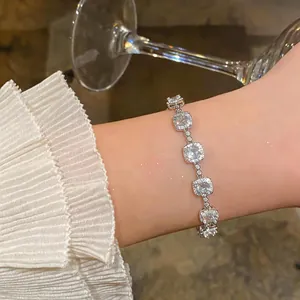 Elegant 18k white gold plated square zirconia bracelet for women detail shot on wrist.