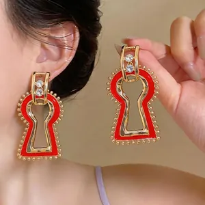 Chic oversized red keyhole geometric resin earrings with gold rhinestones details