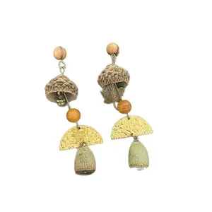 Vintage ethnic-style earrings with sandalwood beads and pine cone tassel pendants.
