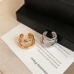 French style double-layered ear clips with hollow braided and smooth gold silver bands