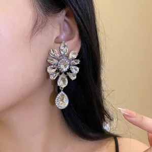 Sparkling rhinestone flower ear clips with teardrop pendant in light luxury style