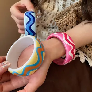 Colorful resin bangles with wavy print for summer beach vacation style