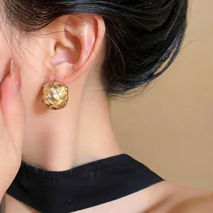 Elegant 18k gold plated woven C-shape ear clips with a French minimalist style