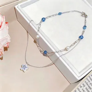 Korean style sweet double-layer necklace featuring zircon star pendant and white pearls