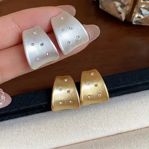 Elegant 18k gold and silver plated brushed stud earrings with zircon accents