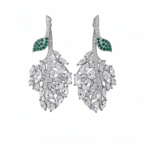 Elegant silver-plated leaf drop earrings with white zircons and emerald green accents.