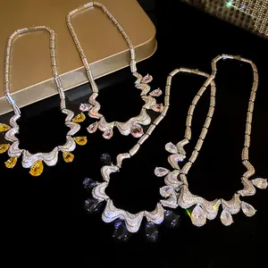 Detailed view of fashionable zircon teardrop pendant necklaces in multiple colors