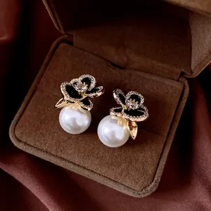 Elegant 14k gold plated flower stud earrings with zircon and large pearls