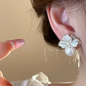 Elegant French style enamel flower stud earrings featuring a delicate white pearl pendant