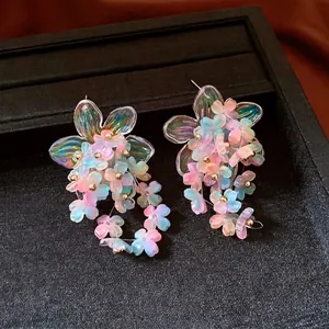 Iridescent floral acrylic stud earrings with gradient petals and gold bead centers