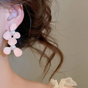 Elegant pink flower stud earrings with white pearls in Korean ins style for summer wear