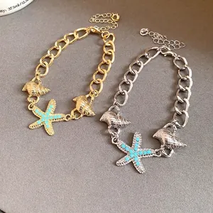 Fashionable gold and silver chain bracelets with seashell and starfish charms