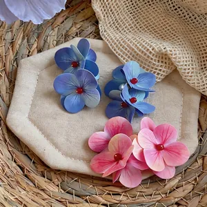 Pendientes elegantes de flores artificiales de gran tamaño en azul y rosa para estilo de playa