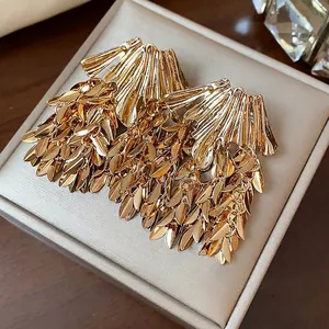 Golden wheat ear leaf tassel drop earrings with luxurious fringe for elegant women.