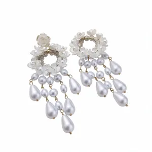Elegant French vintage white resin flower and teardrop pearl dangle earrings for women