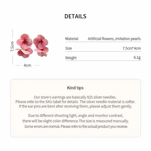 Vista detallada de pendientes florales rosas con dimensiones y especificaciones.