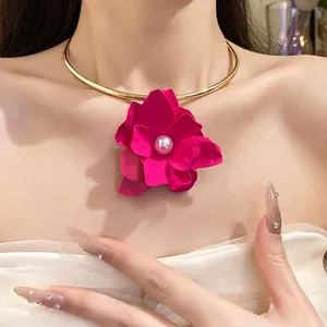 Elegant vintage choker necklace featuring a large fuchsia flower pendant with pearl