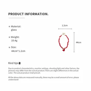 Detail view of red beaded heart necklace with size and material specifications.