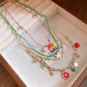 Handmade colorful beaded necklace set with starfish, heart, and moon charms jewelry