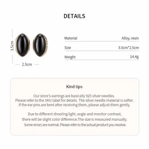 Detailed view of vintage black oval resin earrings with size and material specifications