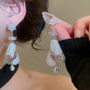 Elegant silver needle zircon drop earrings featuring a sparkling snowflake and tassel design