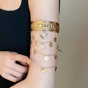 Vintage goldene Oberarmspange mit Münzhängerquasten und Reliefporträts