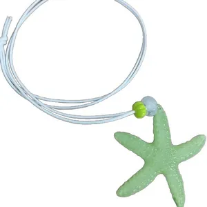 Stylish lime green starfish pendant necklace on white cord for summer beach vacation