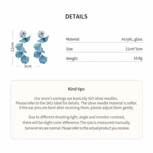 Product details of blue acrylic petal tassel earrings with floral glass studs and tips