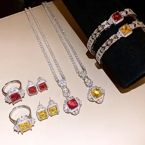Detailed view of a luxury zircon jewelry set featuring red and yellow square-cut stones.