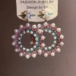 Exquisite silver needle earrings with pink zircon and white pearls in floral double hoop design