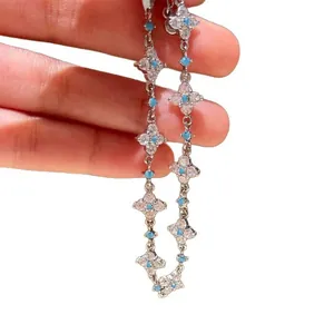Elegante bracciale in argento con fiori di zircone e accenti turchesi per signora