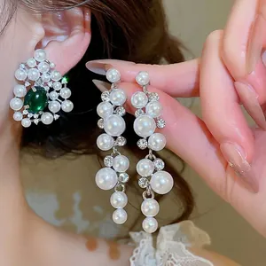 Elegant resin pearl drop earrings with emerald green stone stud for women
