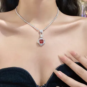 Elegant silver-toned tennis chain necklace with a stunning square red zircon pendant